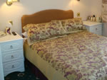 A double bedroom at Hunters Lodge Hotel