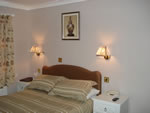 A double bedroom at Hunters Lodge Hotel