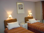 Twin room at Hunters Lodge Hotel